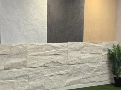 PHOMI oblique stone finishes displayed in a showroom
